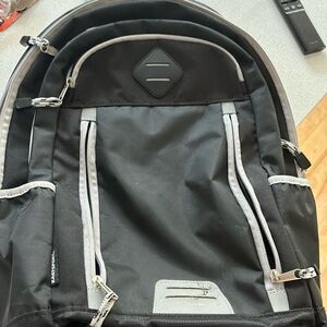 East sport bag pack Color black and gray with multiple zippers